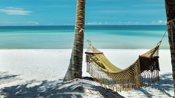 Beach nearby, white sand, free beach shuttle, sun loungers