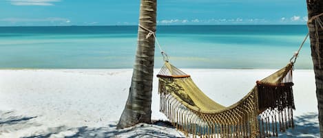 Beach nearby, white sand, free beach shuttle, sun loungers