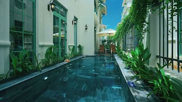 Premium bedding, pillow-top beds, minibar, laptop workspace