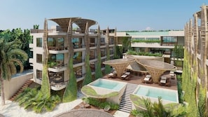 A modern hotel with multiple floors, outdoor pools, and lush greenery. - Ana y Jose Hotel Beach Club Holbox (Isla Holbox)