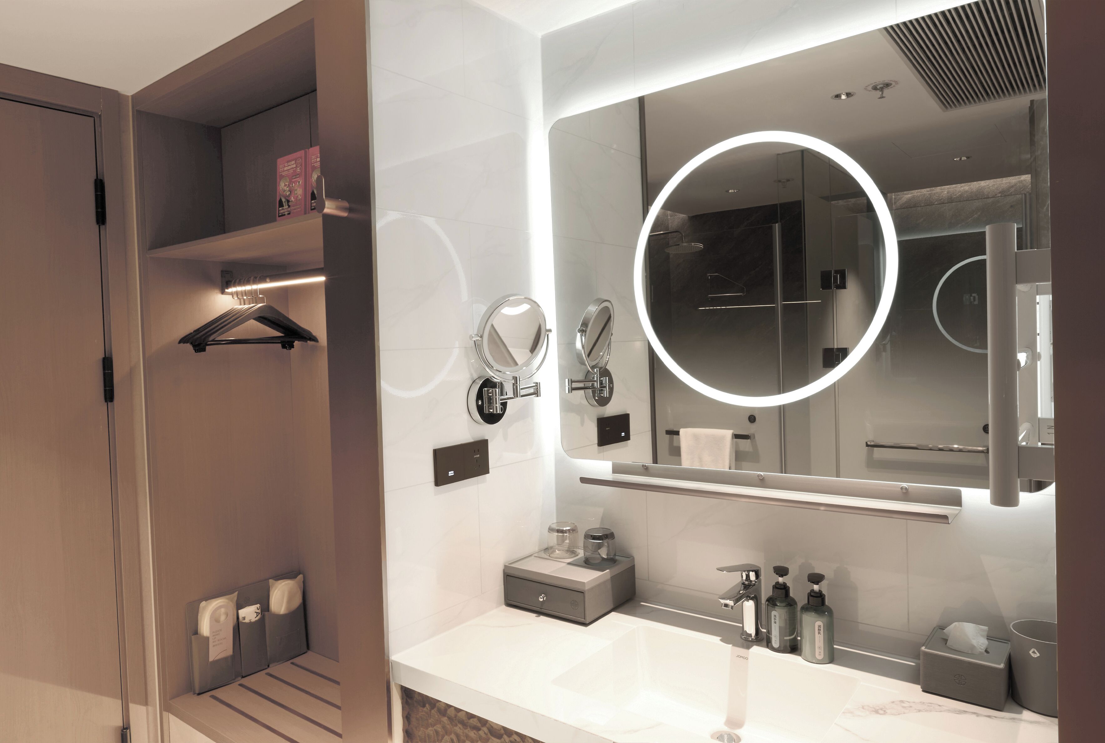 Shower, hair dryer, towels, shampoo