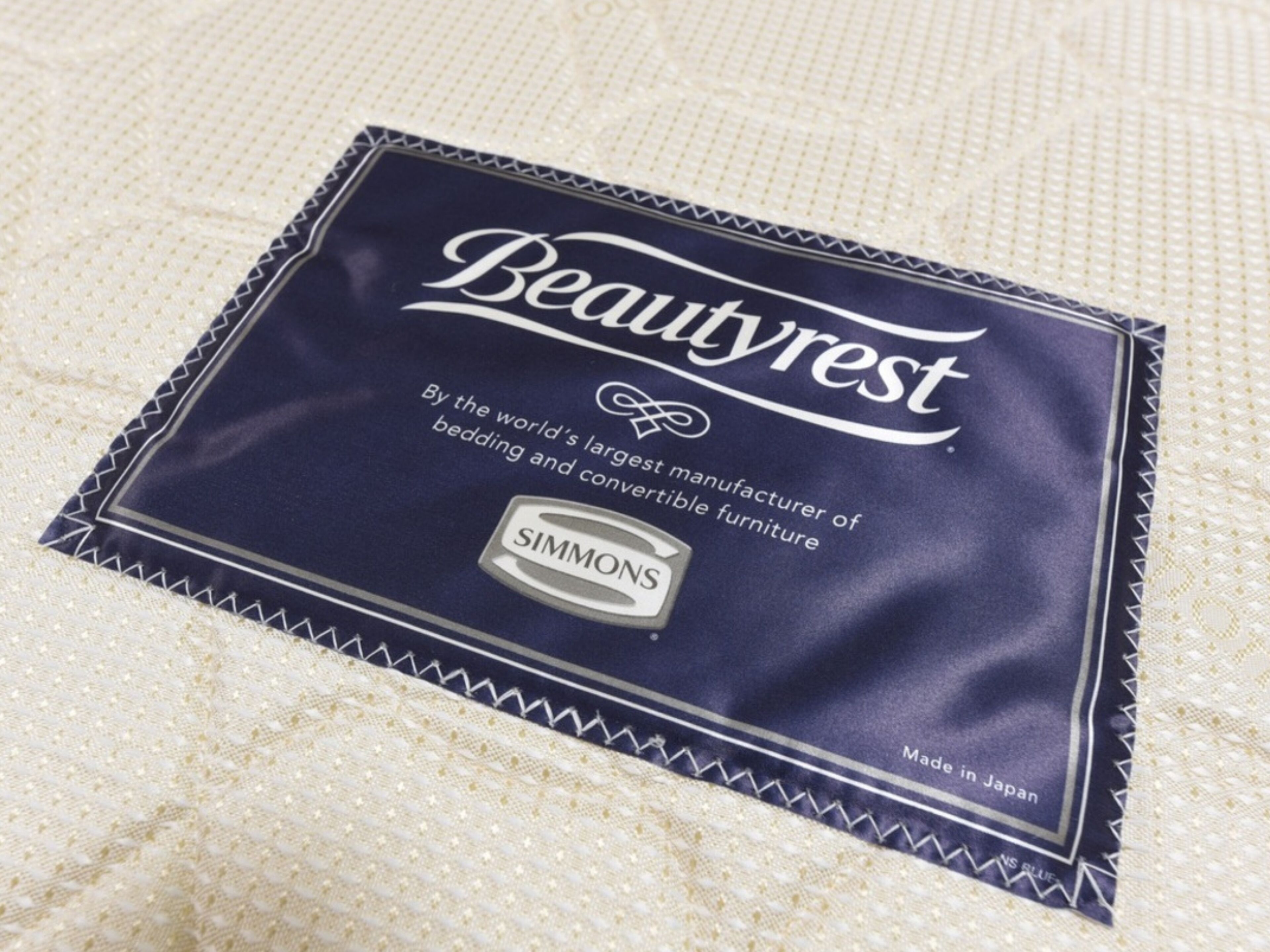 A Beautyrest mattress cover with a SIMMONS logo, indicating it is made in Japan.