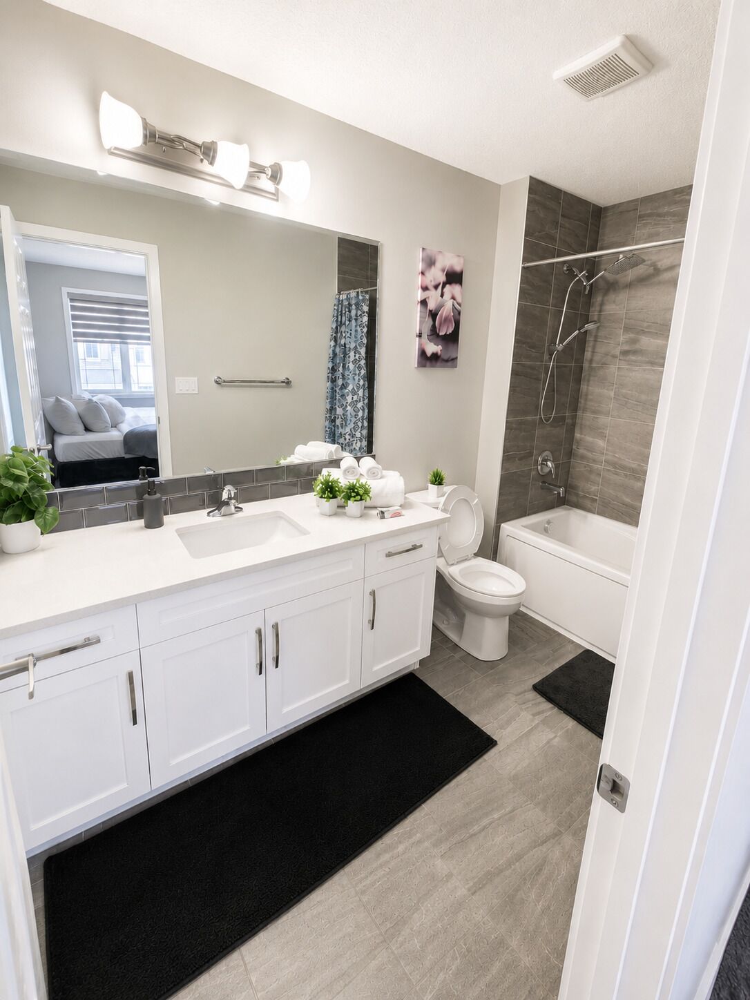 Main ensuite bathroom with bath tub ,shower and toilet jet spray