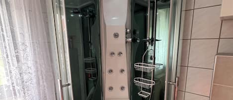 Jetted bath, bidet, towels, soap