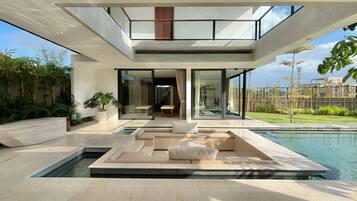Outdoor pool, pool umbrellas, sun loungers