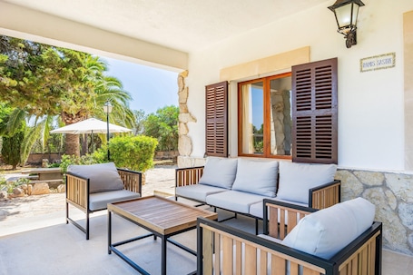 Terrace/patio. Can Jordi in Cala Llombards – Peaceful Mediterranean Retreat