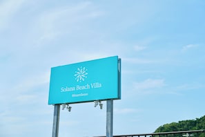 A sign for Solana Beach Villa in Minamiboso.