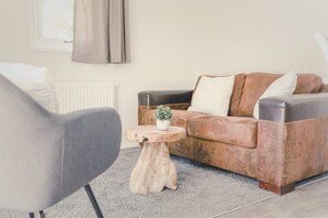 Living area - Picturesque Overijssel Veranda Lodges (Zuna)