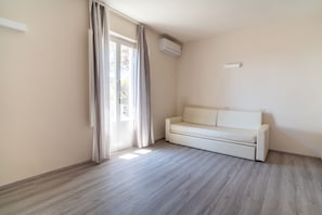 Apartment, Balcony | Minibar, in-room safe, free WiFi