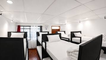 Standard Shared Dormitory, Balcony, Garden View | In-room safe, laptop workspace, free WiFi