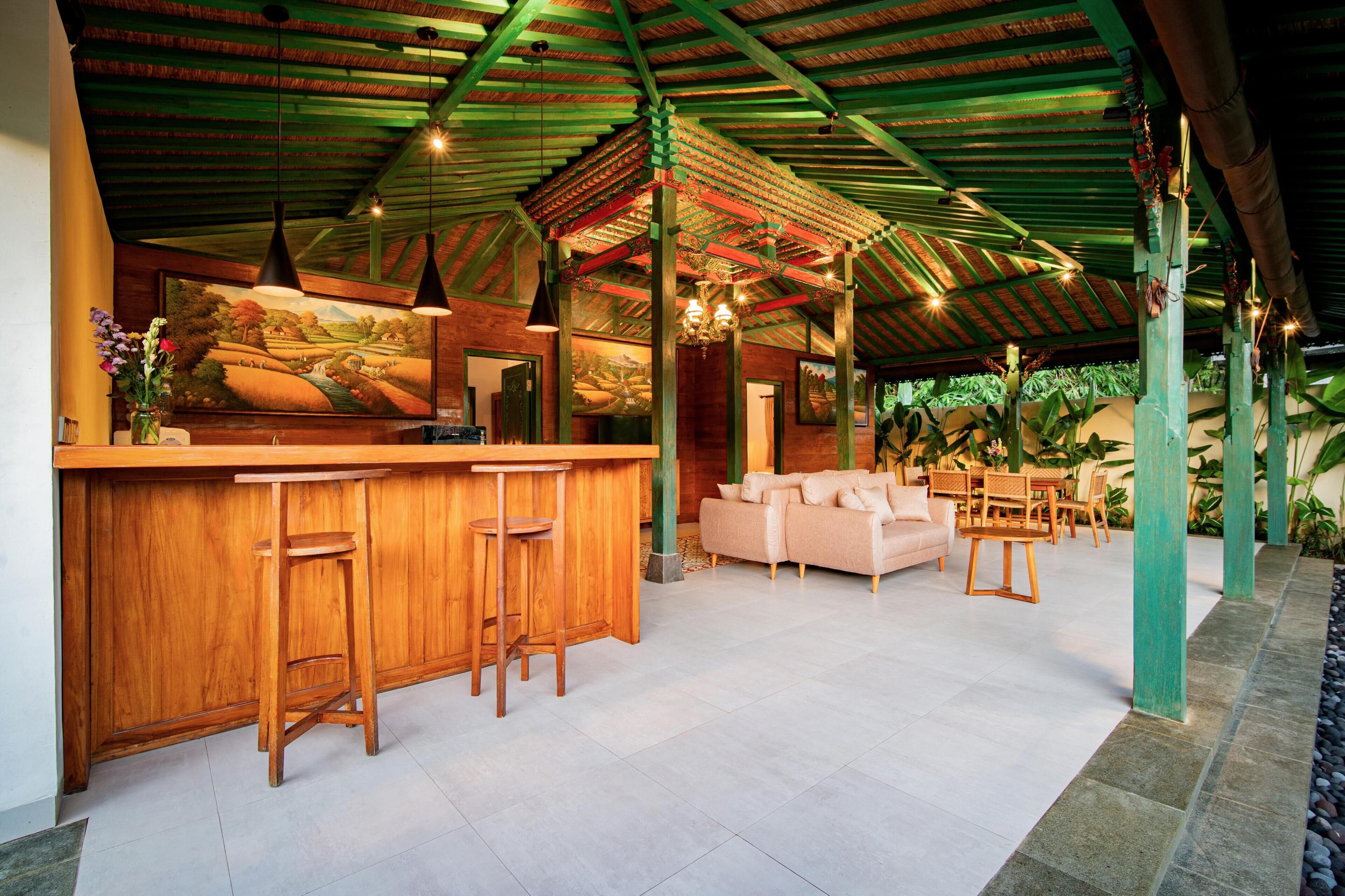 Villa, piscina privada, vistas al jardín | Bar (en el alojamiento)