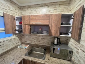 Appartement Deluxe, vue ville | Cuisine privée