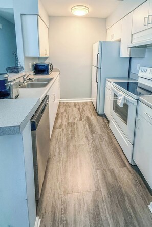 Apartment, Balcony | Private kitchen - Nyakio Suite (Chesapeake)