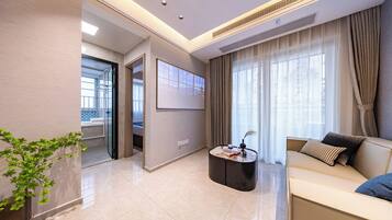 Comfort Suite, Balcony, City View | Blackout drapes, iron/ironing board, free WiFi, bed sheets
