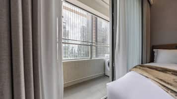 Family Double or Twin Room, Balcony, Garden View | Blackout drapes, iron/ironing board, free WiFi, bed sheets