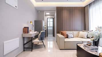 Comfort Suite, Balcony, City View | Living area | Printers