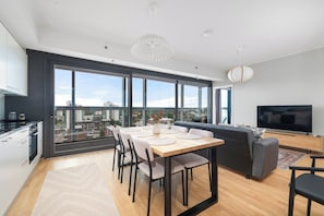 Superior Apartment, 2 Bedrooms, Sauna, City View | Living area | 55-inch Smart TV with cable channels - New 12th Floor 2BR Apt - Stunning Views (Oulu)