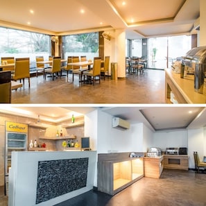 A restaurant with a dining area, a bar, and a kitchen.