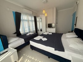 Quarto triplo conforto | Wi-Fi de cortesia