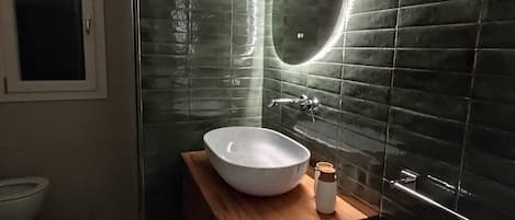 Hair dryer, bidet, towels, soap