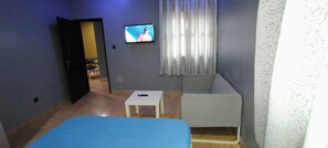 Dormitório compartilhado, 1 quarto | Sala de estar