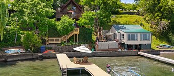 Relax at Poplar Beach Retreat on the sparkling waters of Cayuga Lake. This charming waterfront escape combines rustic character with bright, comfortable living spaces, creating the perfect setting for a relaxing Finger Lakes getaway.