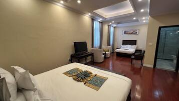 Family Suite, Balcony, City View | In-room safe, iron/ironing board, free WiFi