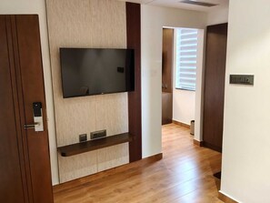Luxury Suite, Balcony, City View | Living area | 43-inch flat-screen TV with digital channels, Netflix - LG CORDIAL (Mysore)