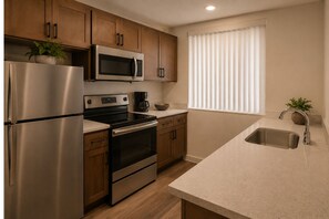 Quarto júnior | Cozinha privada | Geladeira, micro-ondas, fogão, cooktop