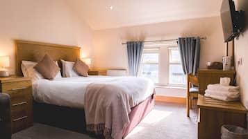 Suite, Private Bathroom | Blackout drapes, iron/ironing board, free WiFi, bed sheets