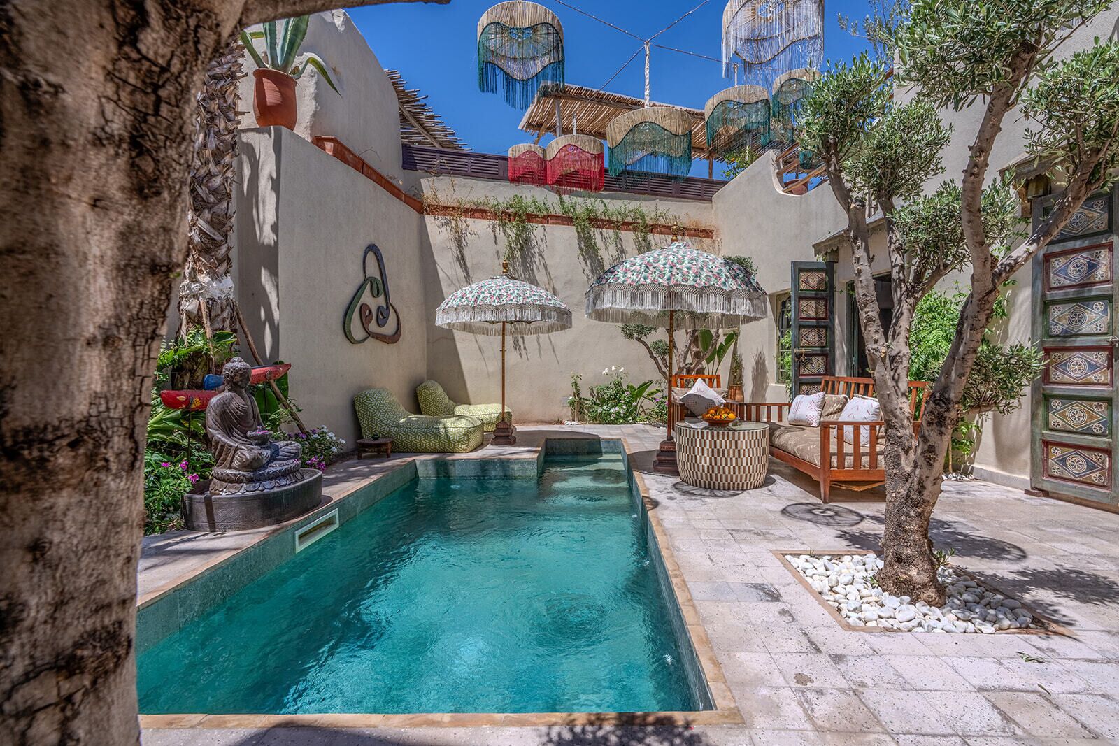 Indoor pool, outdoor pool, pool umbrellas, pool loungers