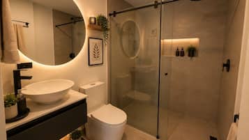 Shower, towels, soap, shampoo