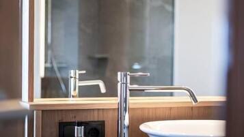 Junior Suite, Mountain View | Bathroom | Shower, hair dryer, slippers, towels