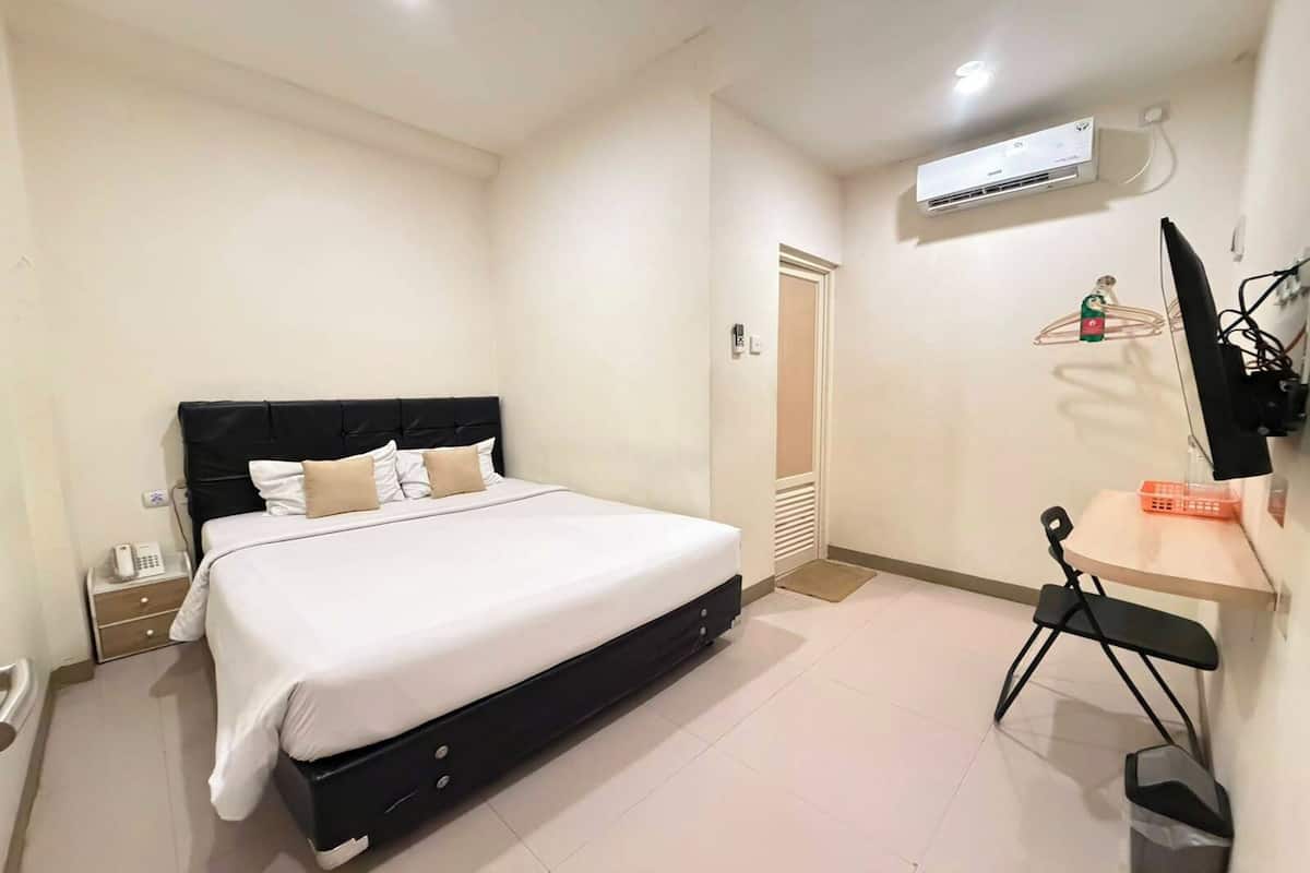 Habitación Deluxe | Escritorio, wifi gratis y ropa de cama