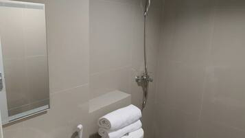 Shower, free toiletries, towels, soap