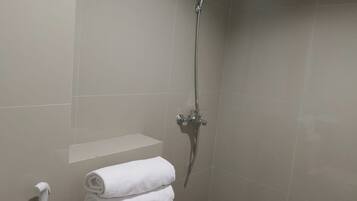 Shower, free toiletries, towels, soap