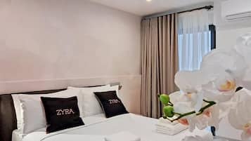 In-room safe, laptop workspace, blackout curtains, free WiFi