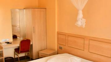 Deluxe Room, Patio, Garden View | Desk, laptop workspace, free WiFi