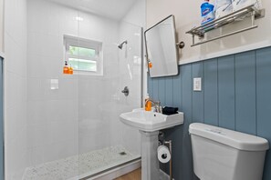 Shower, hair dryer, shampoo