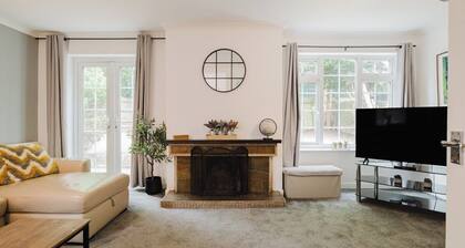 Spacious 4-Bed Home with Free Parking