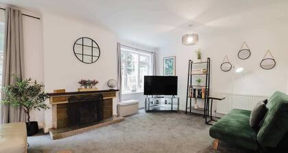 Spacious 4-Bed Home with Free Parking