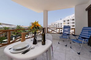 Outdoor dining - San Marino Studio 8 - with pool view and wifi (Los Cristianos)