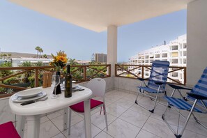 Outdoor dining - San Marino Studio 8 - with pool view and wifi (Los Cristianos)