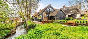 Modern & Historic Mill Flat with Stream Views