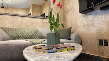 Apartamento família | Área de estar