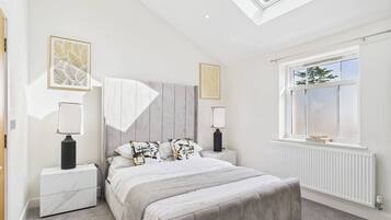 2 bedrooms, desk, iron/ironing board, travel cot