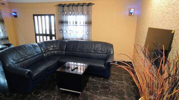 Apartamento Confort, 2 habitaciones | Zona de estar