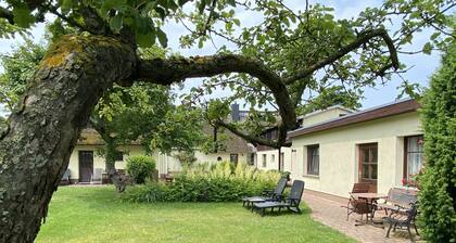 Ferienwohnung mit grünem Gartenblick