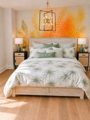A bedroom with a bed, two nightstands, a wall mural, and a hanging light fixture. - #1 Location I Fully Rebuilt 2026 I .9 Miles to Stadium/2.5 Blocks Downtown (Ann Arbor)