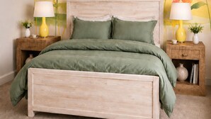 A bedroom with a bed, two nightstands, a wall mural, and a lamp on each nightstand. - #1 Location I Fully Rebuilt 2026 I .9 Miles to Stadium/2.5 Blocks Downtown (Ann Arbor)